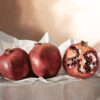 Pomegranates, oil painting on wood panel, 40" x 30" by Debora Levy