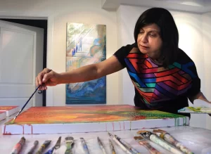 Nimi Trehan in her studio, working on the Aurora series