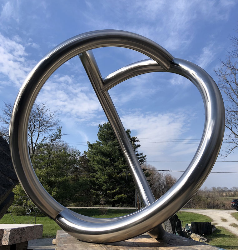 Jon Barlow Hudson, EIDOLON:NATURE, EIDOLON : NATURE, c 2023, stainless steel 27 ft. hi. x 16 ft. dia. black granite laser engraved formulas. Moraine Boulder, 12 ft. hi. x 21 tons. Installed before the Clippinger Chemistry Lab, Ohio University, Athens, OH.